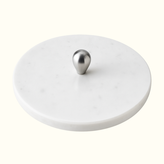 Round white marble serving board with metal knob, Italian handcrafted design