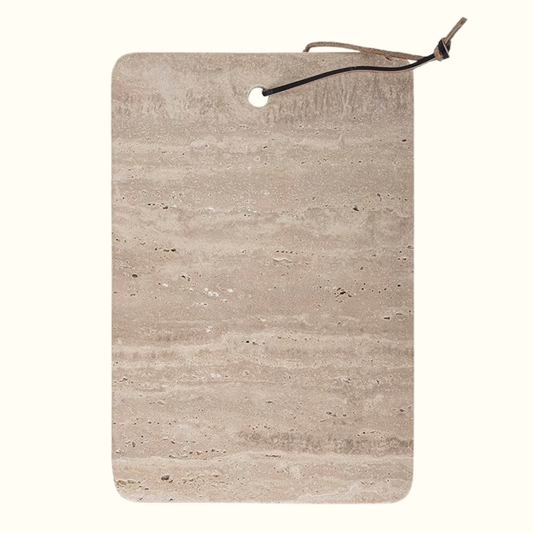 Travertine cutting board with leather strap, handcrafted Italian natural stone design
